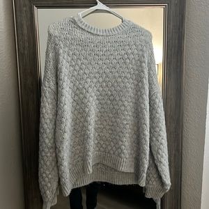 light grey sweater